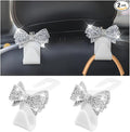 Zpana Bling Car Headreat Hook, 2PCS Crystal Rhinestone Cute Bow Vehicle Seat Back Hanger Storage for Purses Bags Grocery, Diamond Auto Rear Seat Organizer, Universal for SUV Truck Sedan (White)