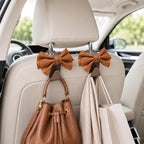 2 Pack Car Purse Holder for Handbags and Bags, Headrest Back Seat Hooks for Cars, Car Bag Hanger for Groceries, Coats, Umbrellas and Daily Essentials, Bow-Shaped Car Interior Organizer (brown)