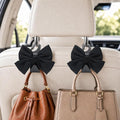 2 Pack Car Purse Holder for Handbags and Bags, Headrest Back Seat Hooks for Cars, Car Bag Hanger for Groceries, Coats, Umbrellas and Daily Essentials, Bow-Shaped Car Interior Organizer (Black silk)