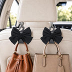 2 Pack Car Purse Holder for Handbags and Bags, Headrest Back Seat Hooks for Cars, Car Bag Hanger for Groceries, Coats, Umbrellas and Daily Essentials, Bow-Shaped Car Interior Organizer (Black silk)