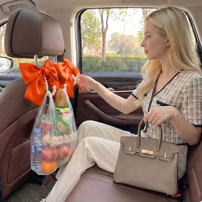 2PCS Satin Bow Pearl Car Seat Headrest Hooks – Car Bag Holder & Vehicle Hanger for Purses – Cute Coquette Aesthetic Interior Decoration – Cute Auto Organizer Accessories Universal (Orange)